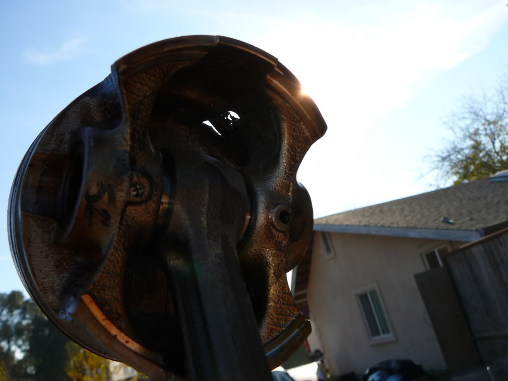 Name:  moltenpiston.jpg
Views: 126
Size:  70.5 KB